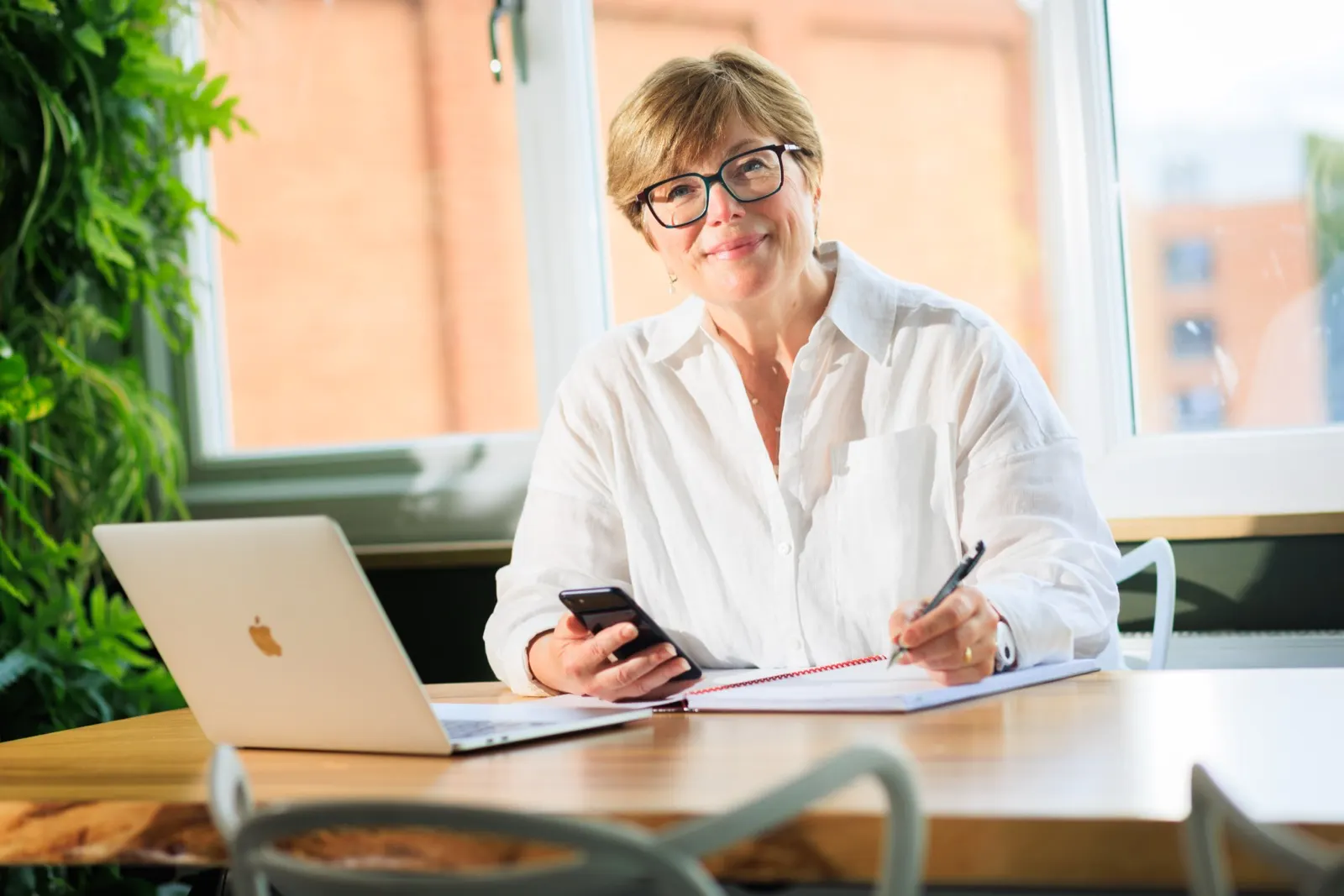 Joanne Dolezal reviewing digital content across devices